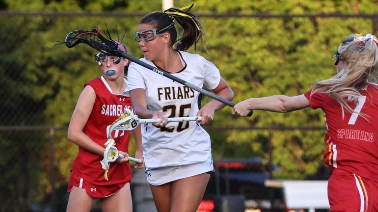 Jena Binkis of St. Anthony's scores her third goal of...