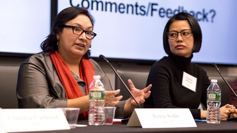 Irma Solis, left, director of the Suffolk County chapter of...