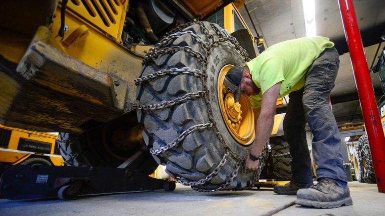 Andy Brown, a highway equipment operator for the Brattleboro, Vt.,...