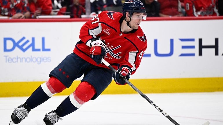 Washington Capitals left wing Beck Malenstyn (47) in action during...