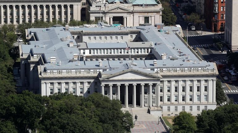 The U.S. Treasury Department building viewed from the Washington Monument,...