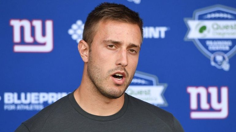 New York Giants quarterback Kyle Lauletta speaks to the media...