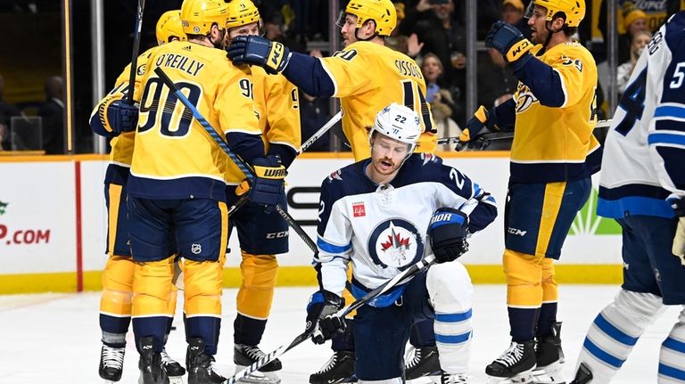 Winnipeg Jets center Mason Appleton (22) reacts after a goal...