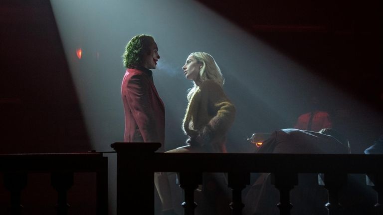 Joaquin Phoenix as Arthur Fleck/Joker and Lady Gaga as Lee...