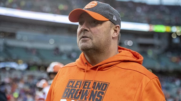 Then-Browns head coach Freddie Kitchens walks off the field after...