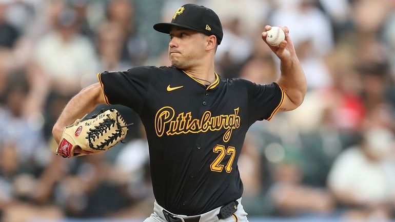 Pittsburgh Pirates' Marco Gonzales throws the ball during the first...