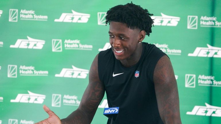 Jets cornerback Sauce Gardner speaks to the media during a joint...