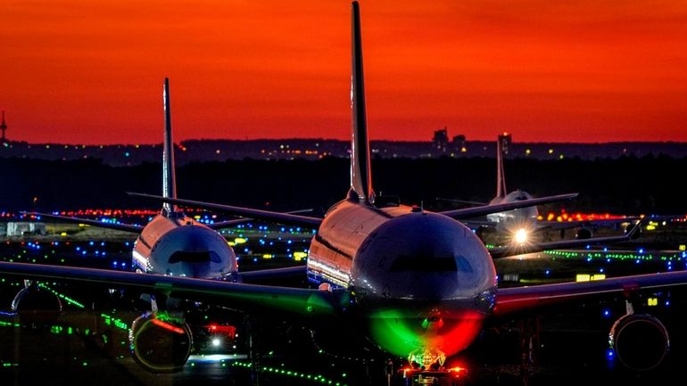 Aircrafts roll over a runway at the airport in Frankfurt,...