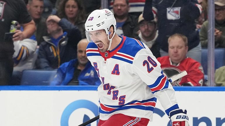 Chris Kreider #20 of the Rangers celebrates after scoring his...