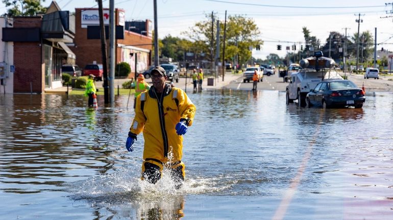 Nassau Police work on trying to clear abandoned cars and...