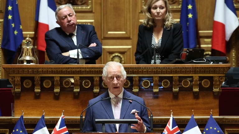 Britain's King Charles III addresses French lawmakers from both the...