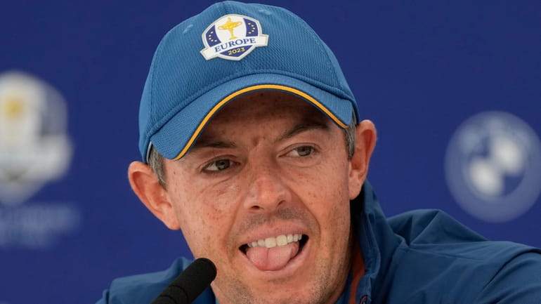 Europe's Rory McIlroy meets the journalists during a press conference...