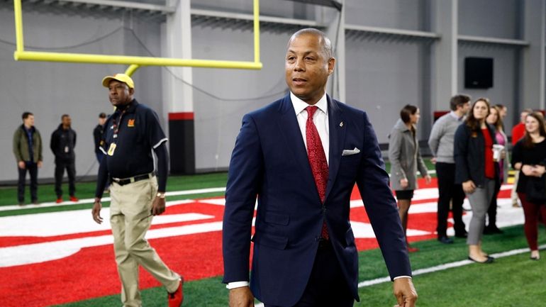 Maryland athletic director Damon Evans arrives at an NCAA college...