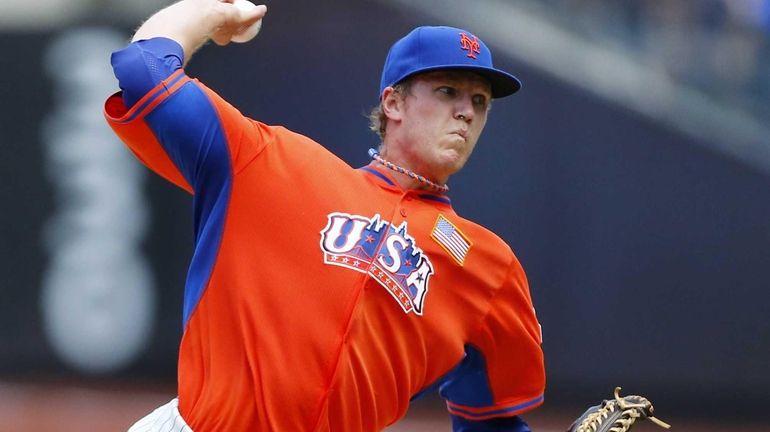 Mets prospect Noah Syndergaard of Team USA delivers a pitch...