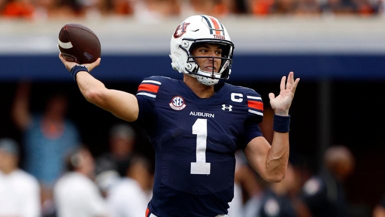 Auburn quarterback Payton Thorne looks to throw a pass during...