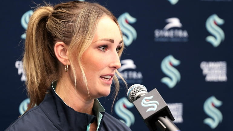 Seattle Kraken new assistant coach Jessica Campbell speaks during an...