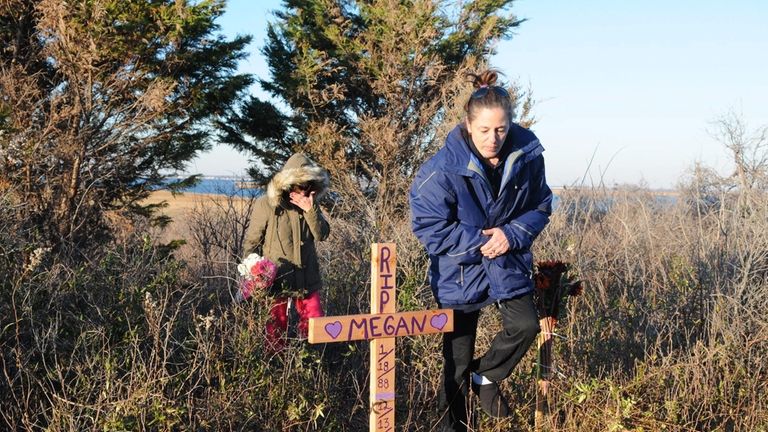 Lorraine Ela, mother of Megan Waterman, visits the site where...