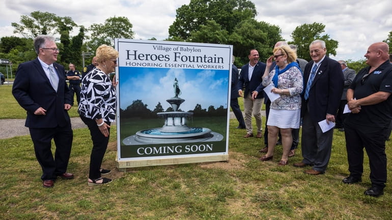 Babylon Village officials gathered recently to announce the plan for "Heroes...