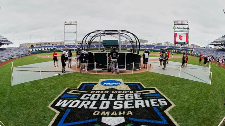 The College World Series logo is displayed in front of...