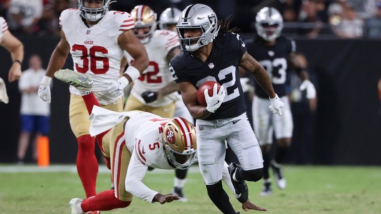 Las Vegas Raiders wide receiver Tyreik McAllister (32) returns a...