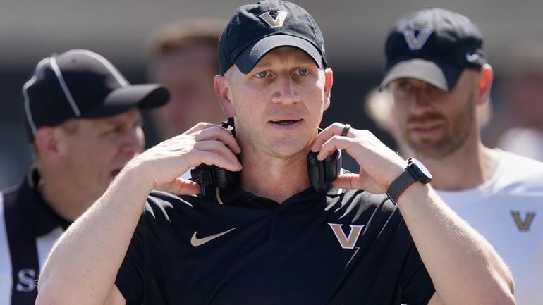 Vanderbilt head coach Clark Lea walks the sideline in the...