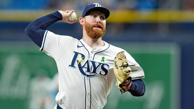 Tampa Bay Rays starting pitcher Zack Littell delivers to the...