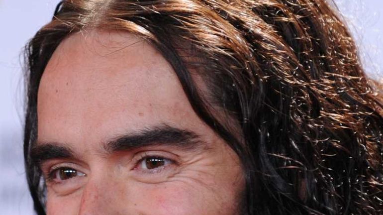 British comedian Russell Brand arrives at Amnesty International's Secret Policeman's...