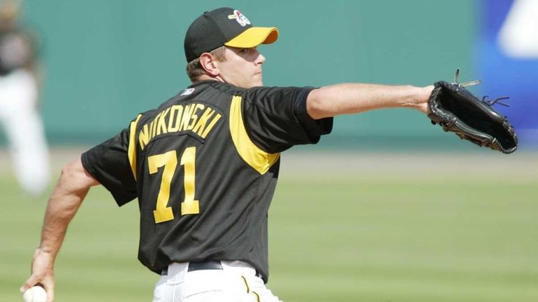 C.J. Nitkowski of the Pittsburgh Pirates pitches in a spring...