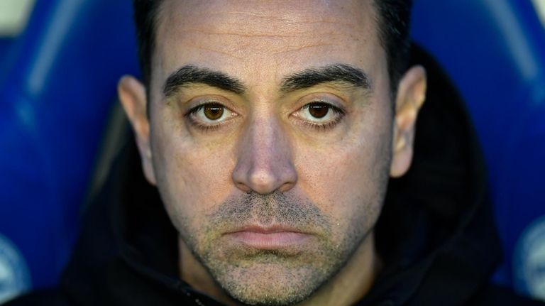 Barcelona's head coach Xavi Hernandez waits for the start of...