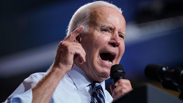 President Joe Biden speaks during a rally at Richard Montgomery...