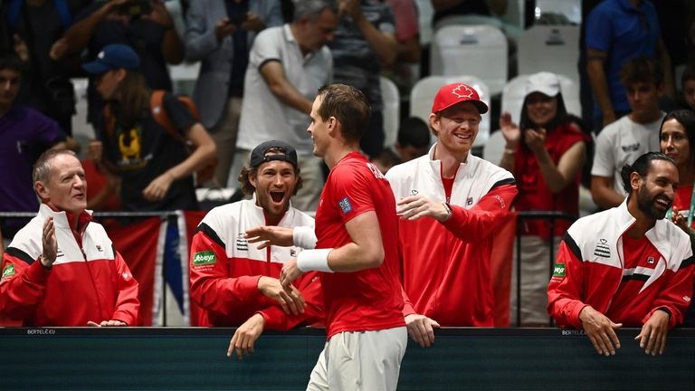 Canada's Vasek Pospisil celebrates beating Sweden's Leo Borg during their...