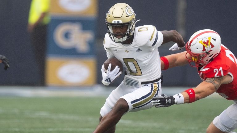 Georgia Tech wide receiver Christian Leary (0) runs afte r...