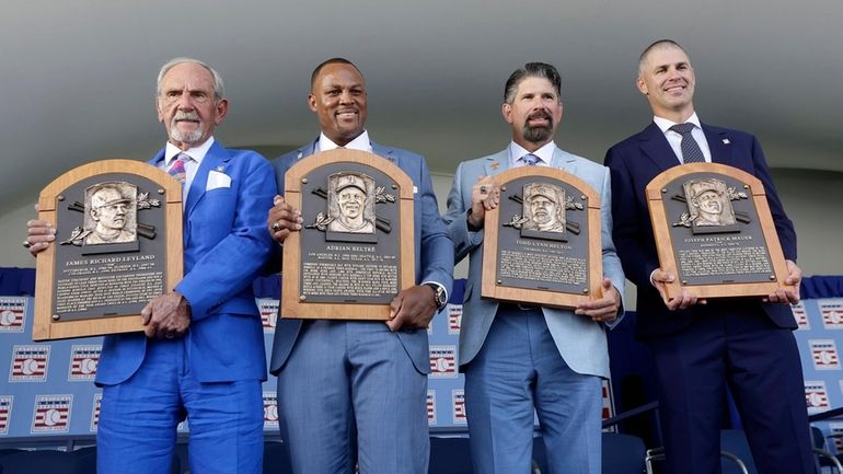 COOPERSTOWN, NEW YORK - JULY 21: Inductees, from left, Jim...