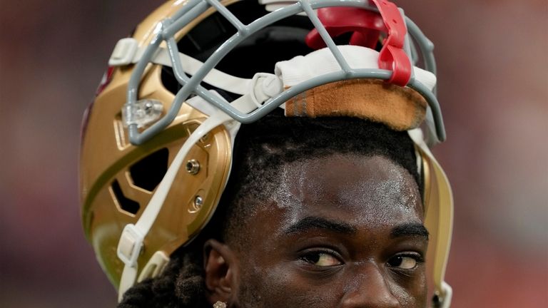 San Francisco 49ers wide receiver Brandon Aiyuk (17) stands on...