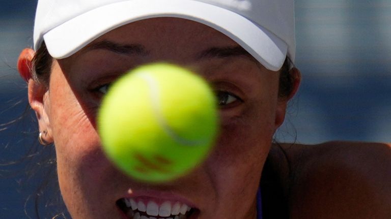 Jessica Pegula, of the United States, returns a shot during...