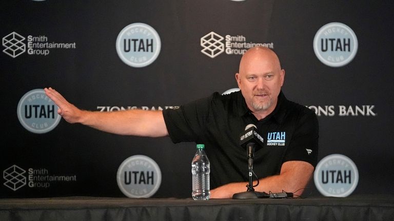 Utah Hockey Club coach Andre Tourigny speaks during NHL hockey...