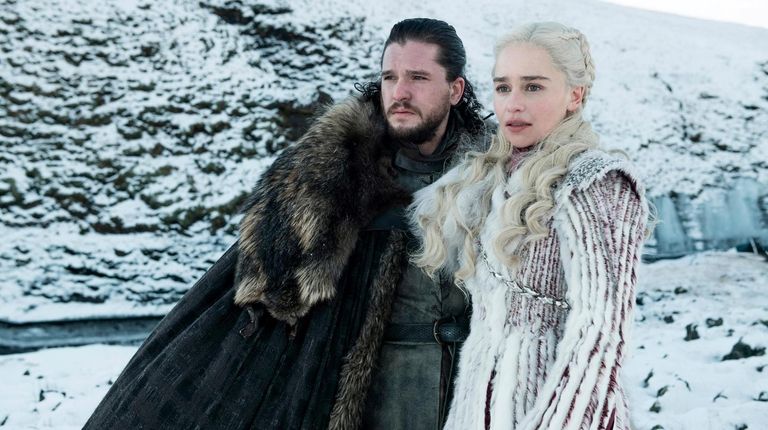 Kit Harington and Emilia Clarke in HBO's Season 8 of...