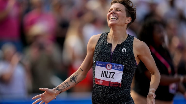 Nikki Hiltz celebrates after winning the women's 1500-meter final during...