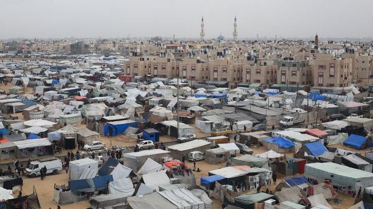 A tent camp housing Palestinians displaced by the Israeli offensive...