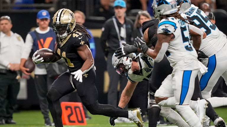 New Orleans Saints running back Alvin Kamara (41) runs the...