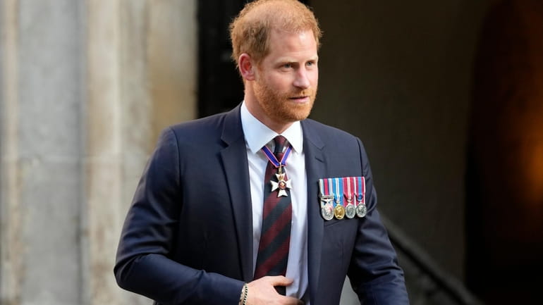 Britain's Prince Harry leaves after attending an Invictus Games Foundation...