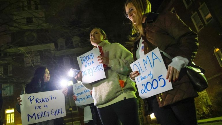 Alumnae from Our Lady of Mercy Academy in Syosset gather outside...