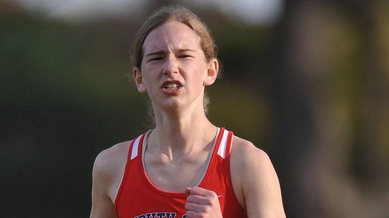 Carly Woelfel runs to Nassau Class B title at state...