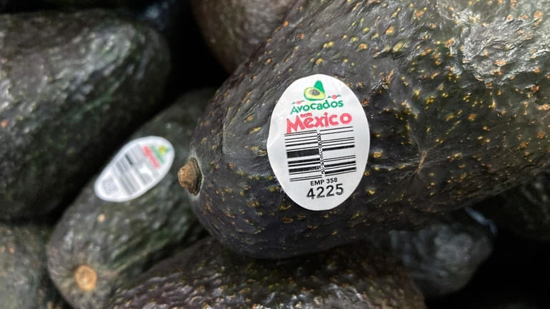 Avocados from Mexico are for sale at a grocery store...