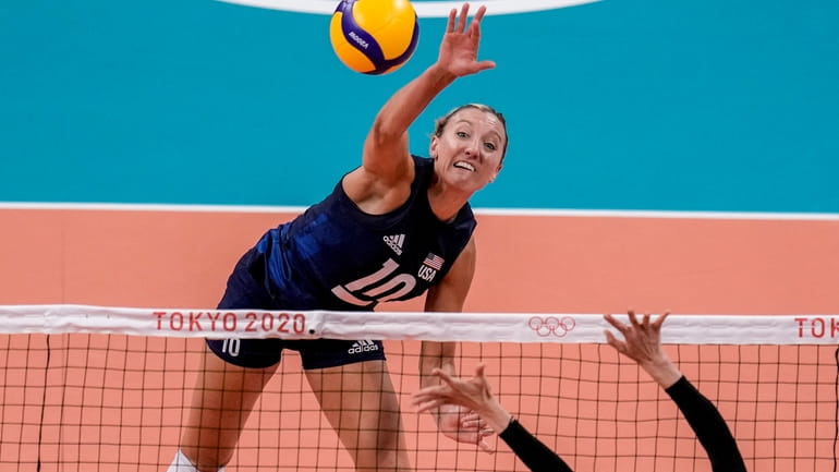 United States' Jordan Larson spikes the ball during the women's...