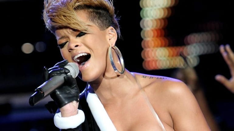 MIAMI BEACH, FL - FEBRUARY 04: Singer Rihanna performs onstage...