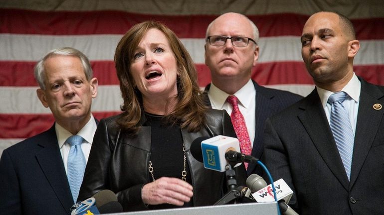 From left, Reps. Steve Israel (D-Huntington), Kathleen Rice (D-Garden City),...