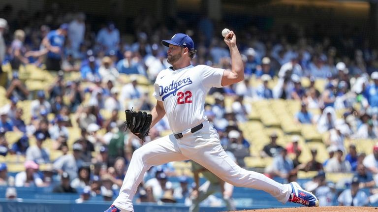 Los Angeles Dodgers starting pitcher Clayton Kershaw (22) throws during...