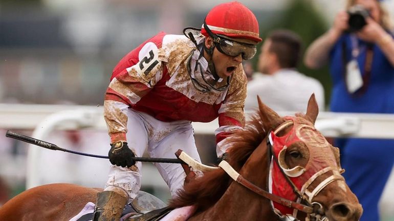 Rich Strike, with Sonny Leon up, wins the 148th running...