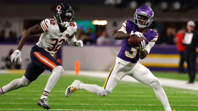 Minnesota Vikings wide receiver Jordan Addison (3) catches a pass...